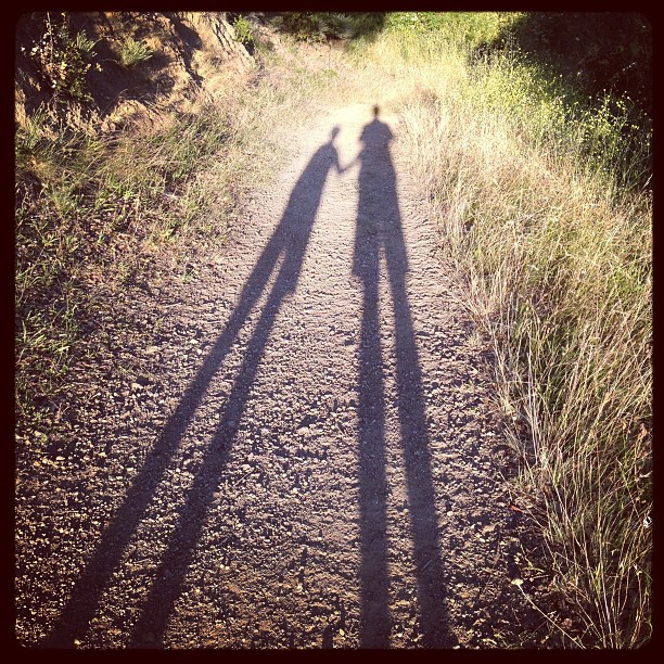 Miles and I on a sunset hike, long evening shadows. Frabjous day.Â 